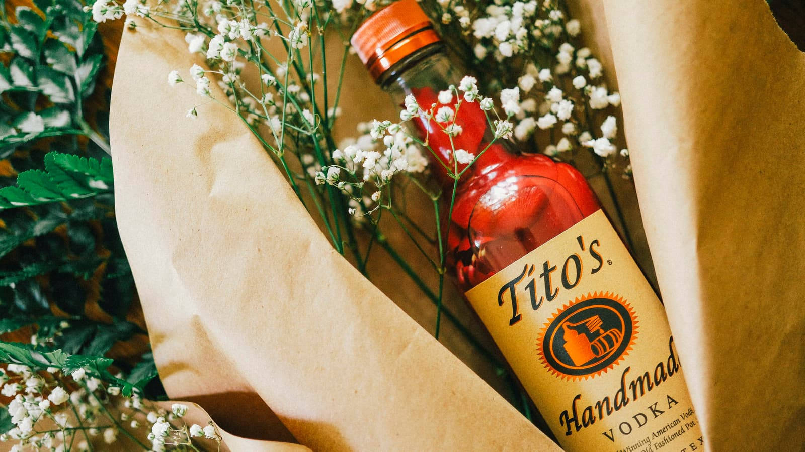 Titos Vodka With Small White Flowers