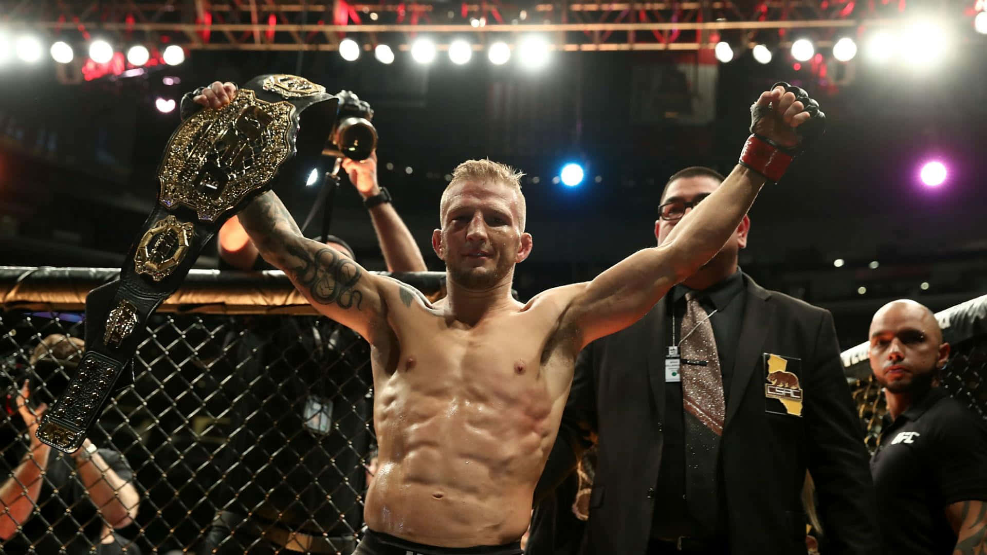 Tj Dillashaw Holding His Championship Belt Background