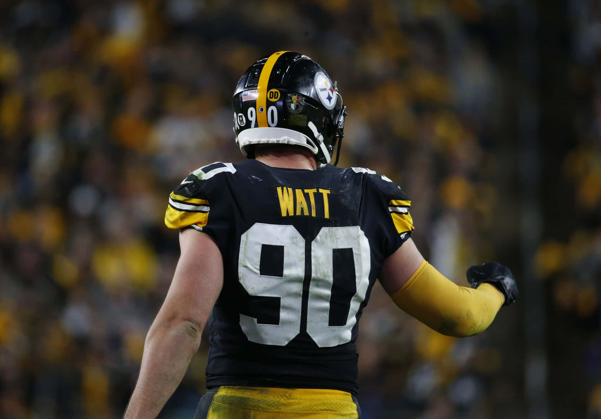 Tj Watt Of The Pittsburgh Steelers In Action Background