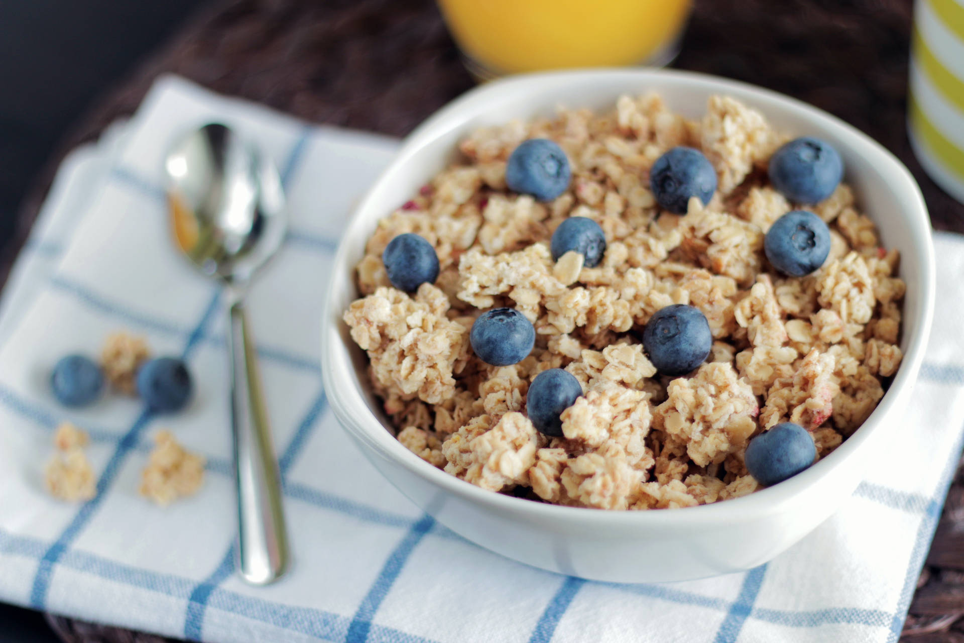 Toasted Oatmeal Cereal With Blue Berries Background