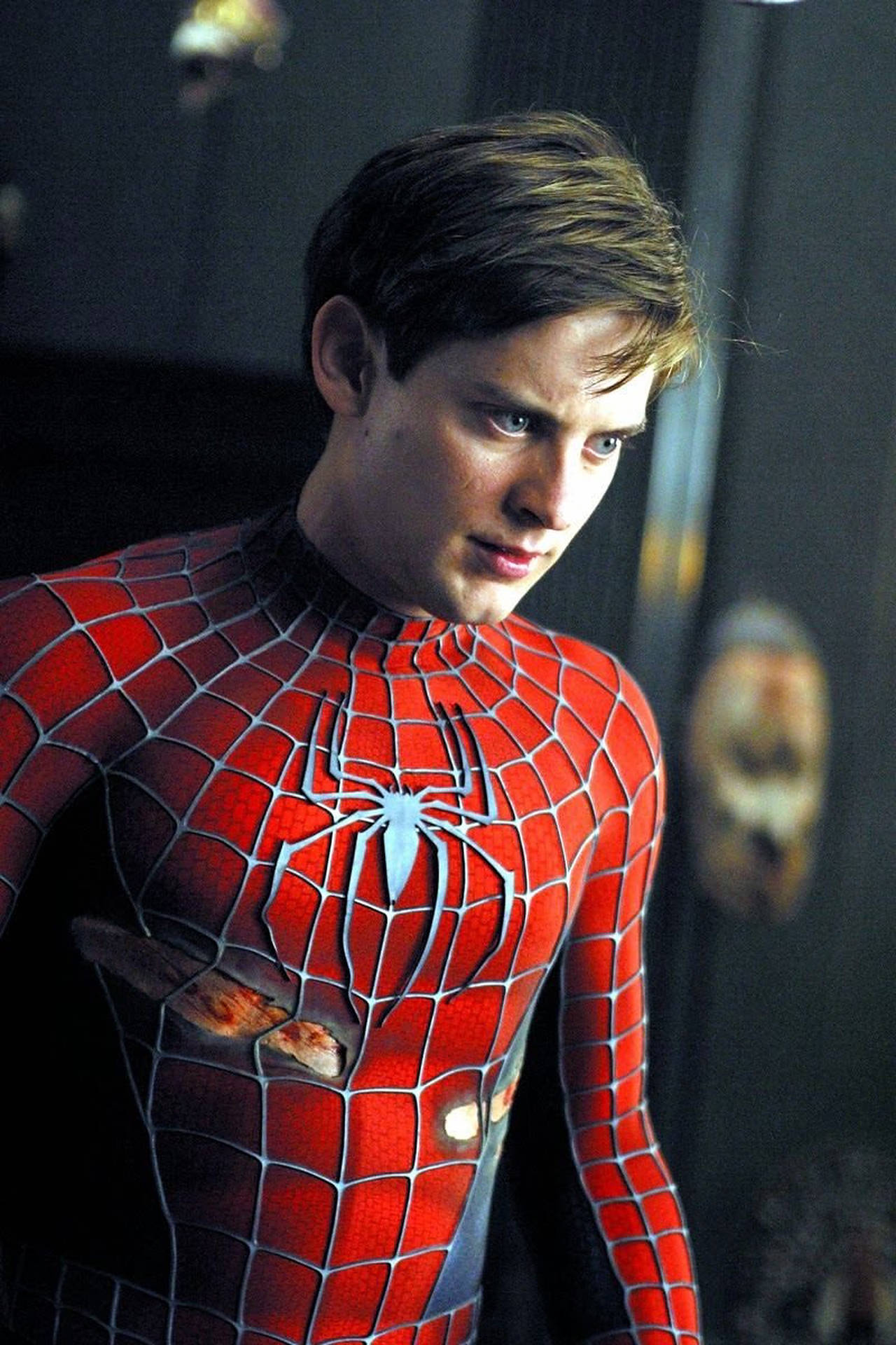 Tobey Maguire In Ripped Spider-man Suit Background