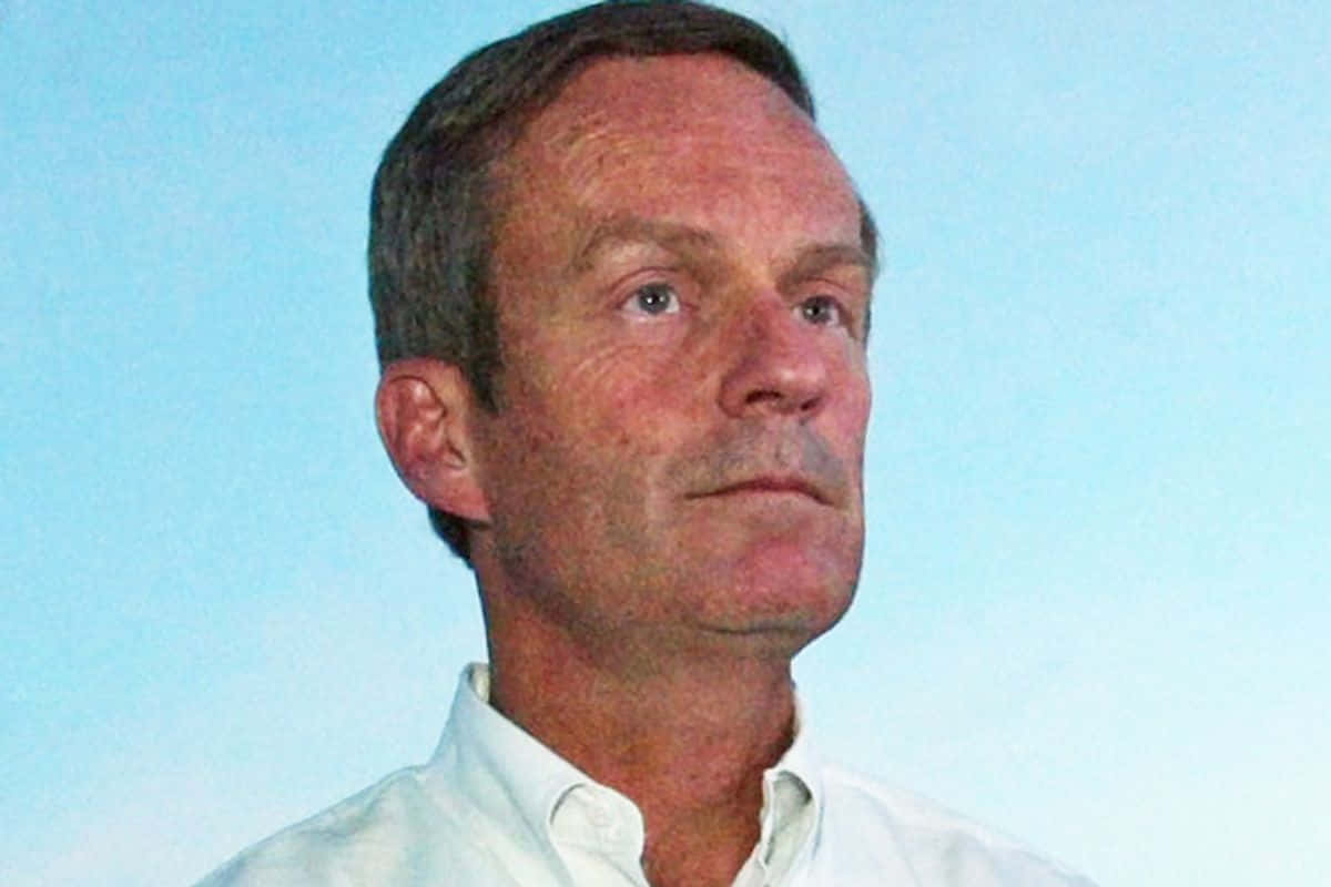 Todd Akin Poses Under A Serene And Clear Blue Sky.