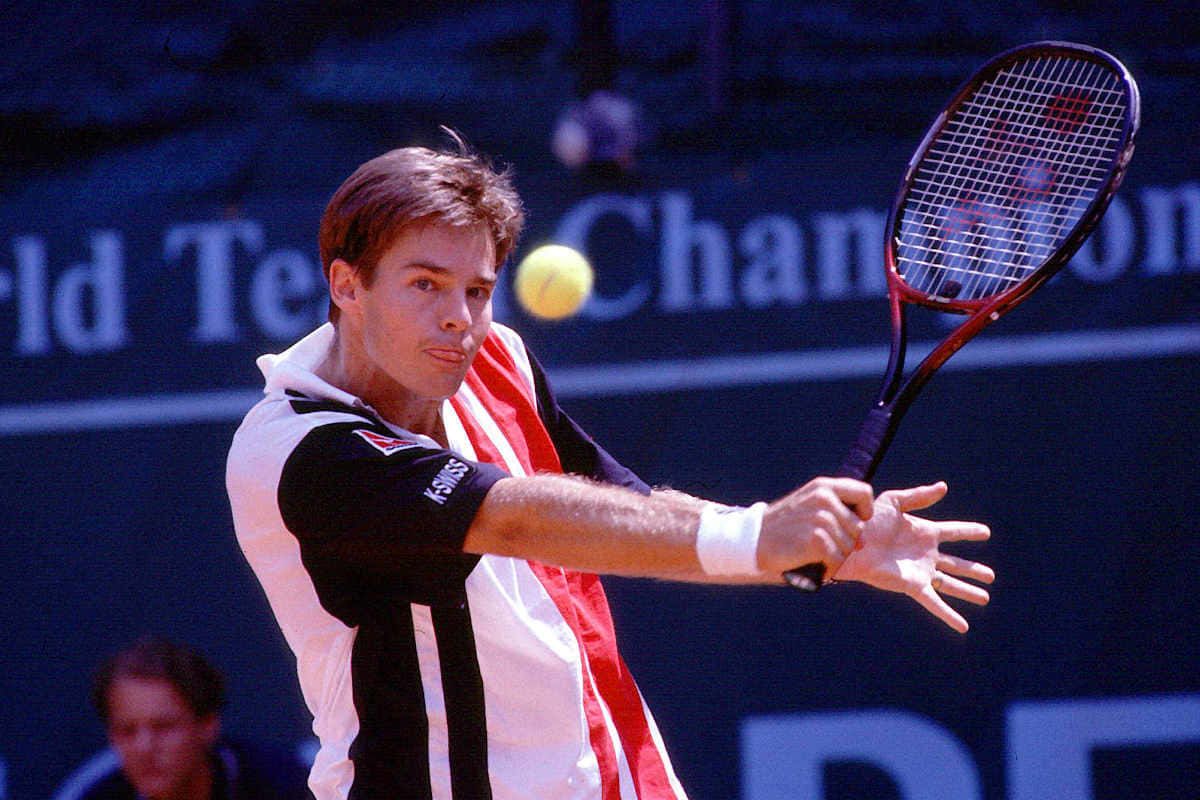 Todd Woodbridge Aiming Racket Background