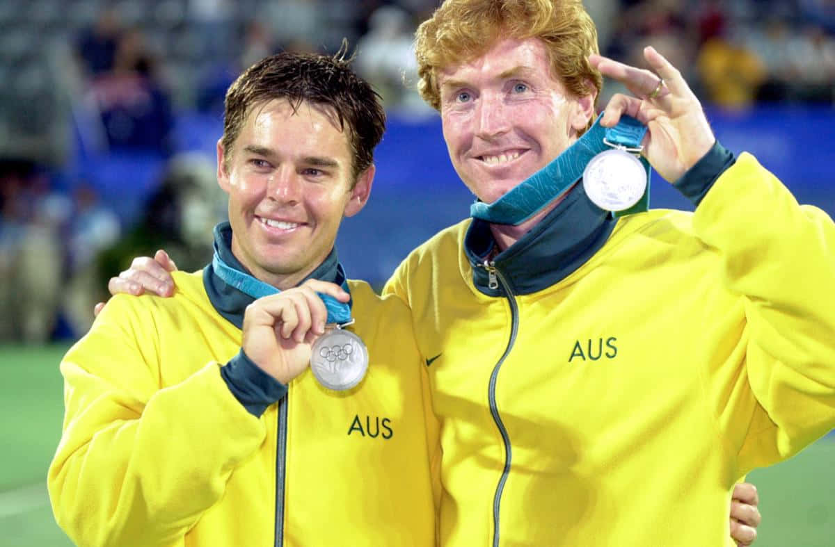 Todd Woodbridge Holding Medal Background