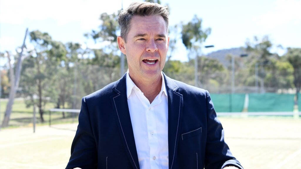 Todd Woodbridge Talking On Court Background