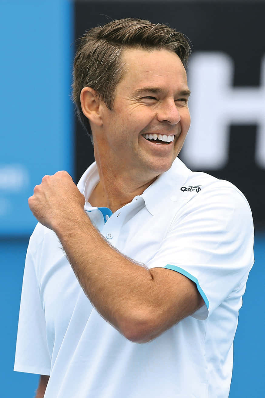 Todd Woodbridge - Triumph And Joy On The Tennis Court Background