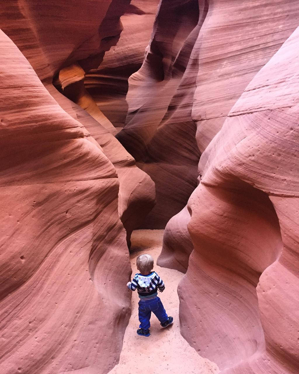 Toddler At Antelope Canyon Background