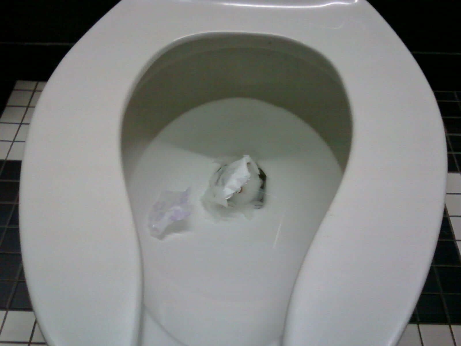 Toilet With Discarded Tissue Background