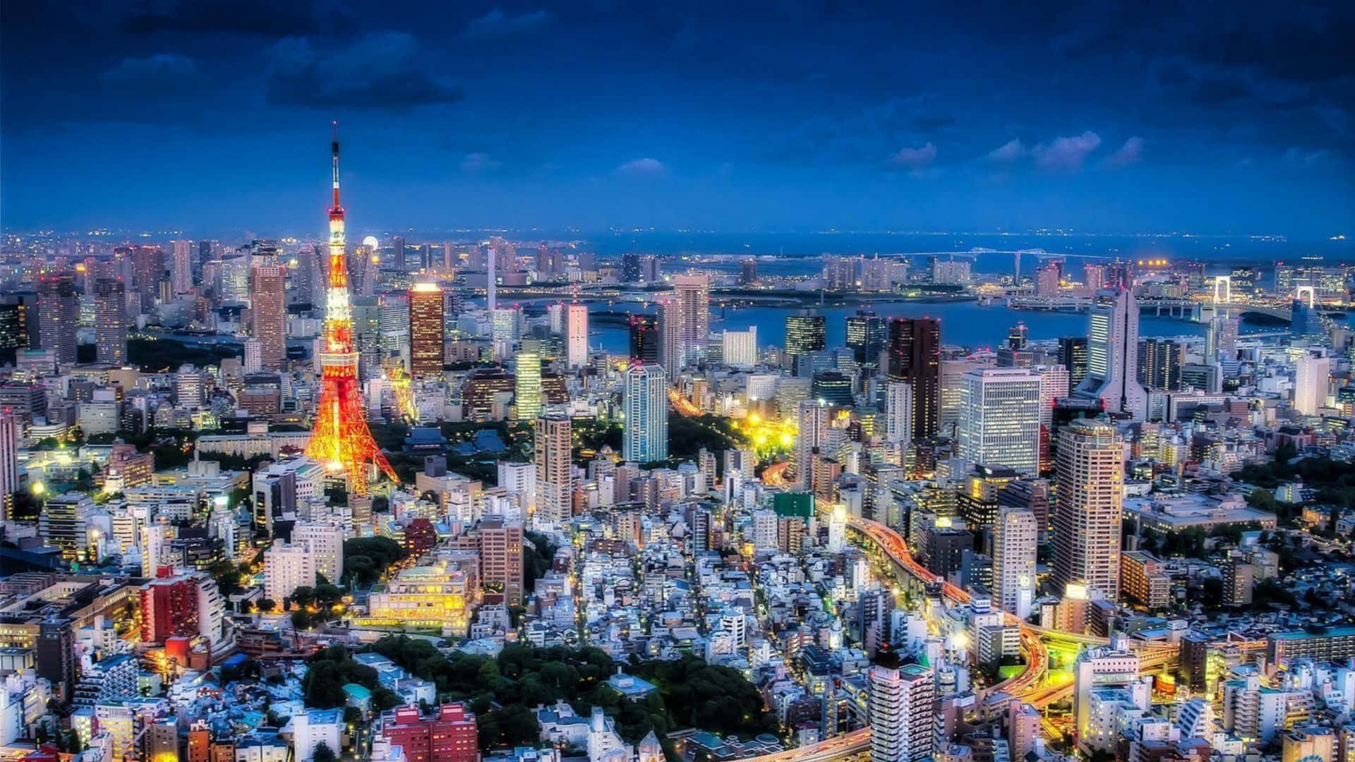 Tokyo City At Night With The Taito Tower Background