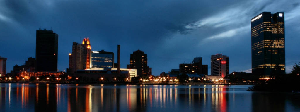 Toledo Skyline At Night Background