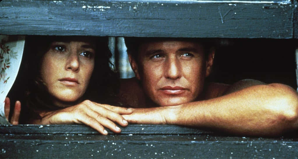 Tom Berenger In A Serious Pose Background