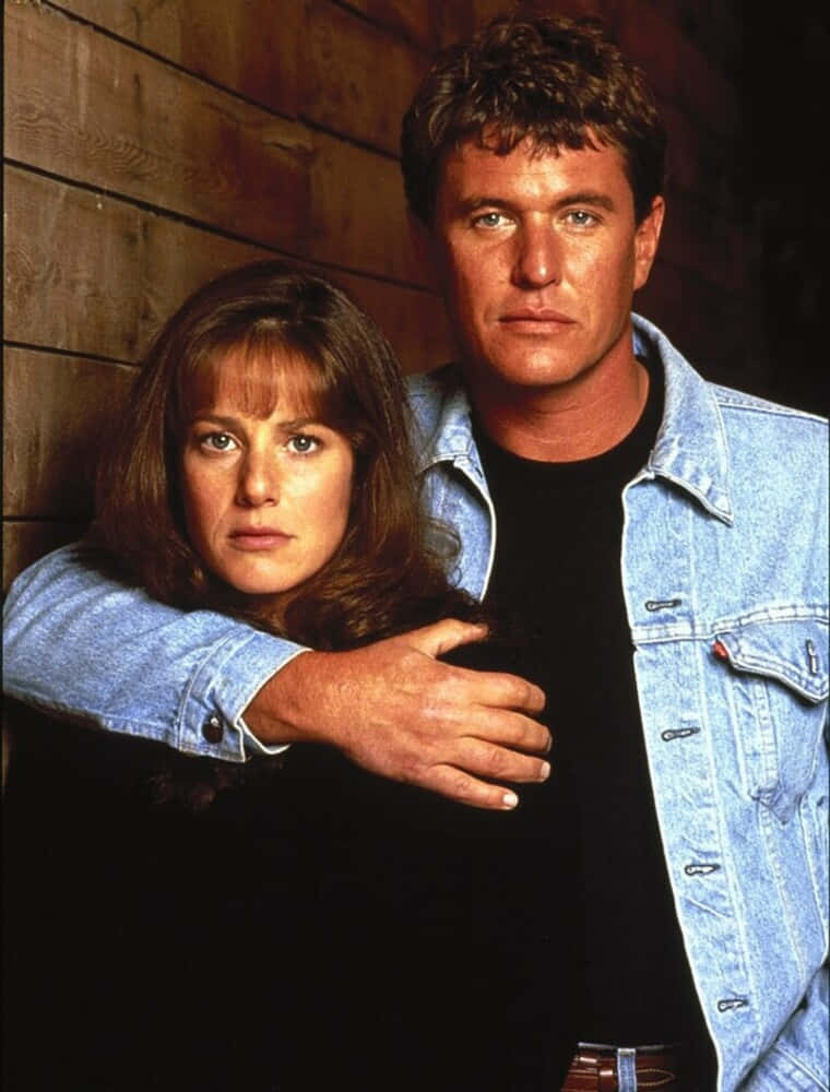 Tom Berenger Striking A Pose In A Casual Outfit Background