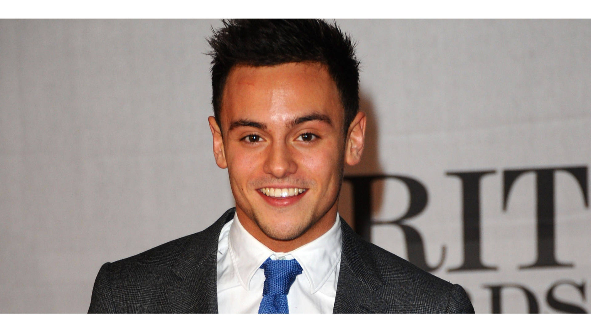 Tom Daley In Suit Background
