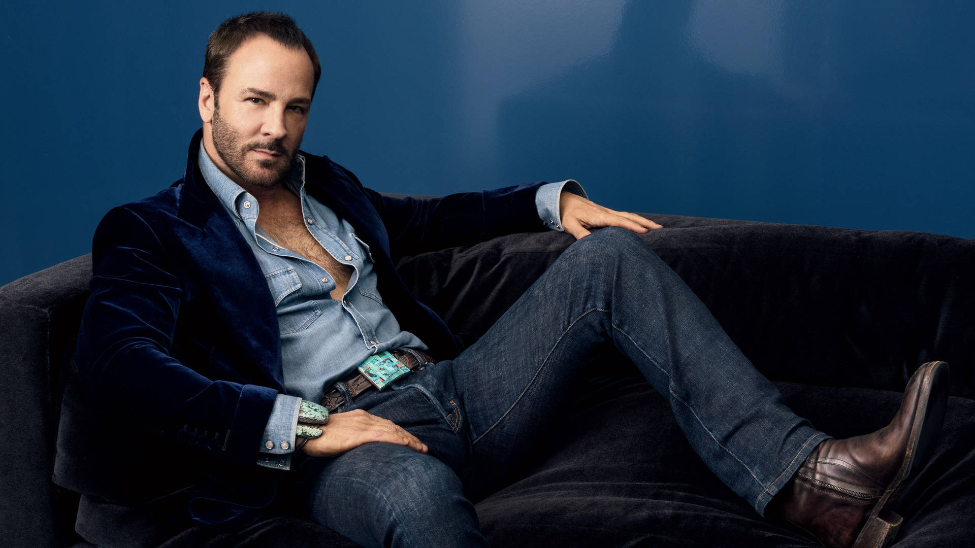 Tom Ford Showcasing His Exquisite Fashion Collection Background