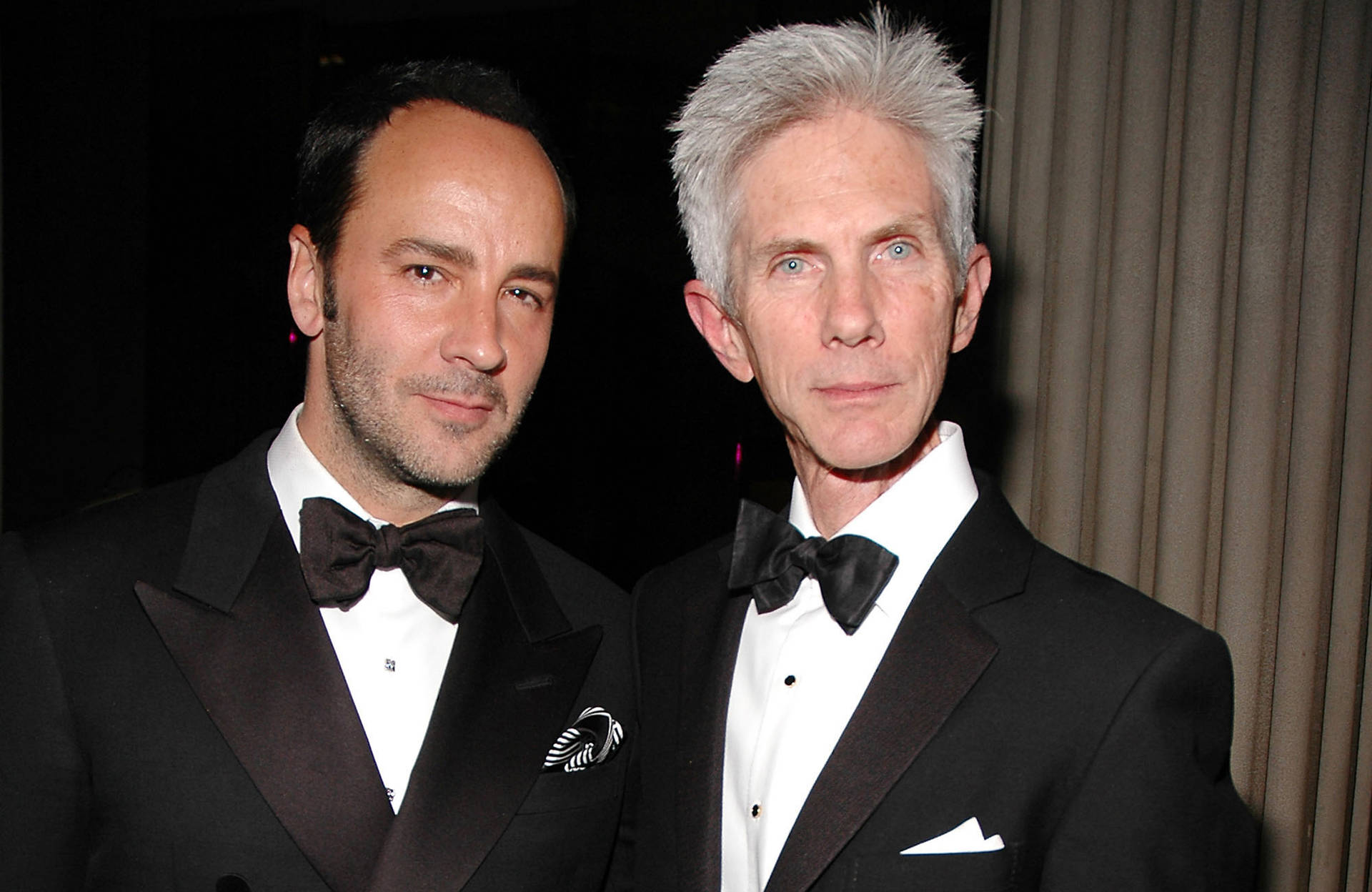 Tom Ford With His Husband, Richard Buckley, Exuding Elegance And Sophistication. Background