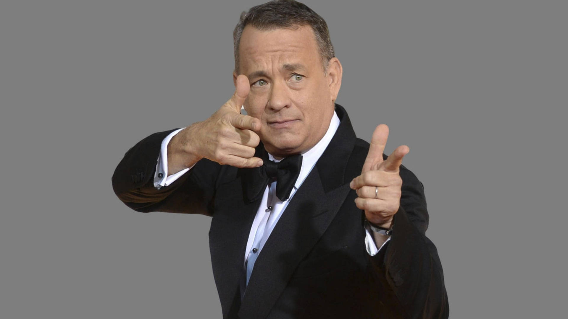 Tom Hanks Hand Gun Gesture Background