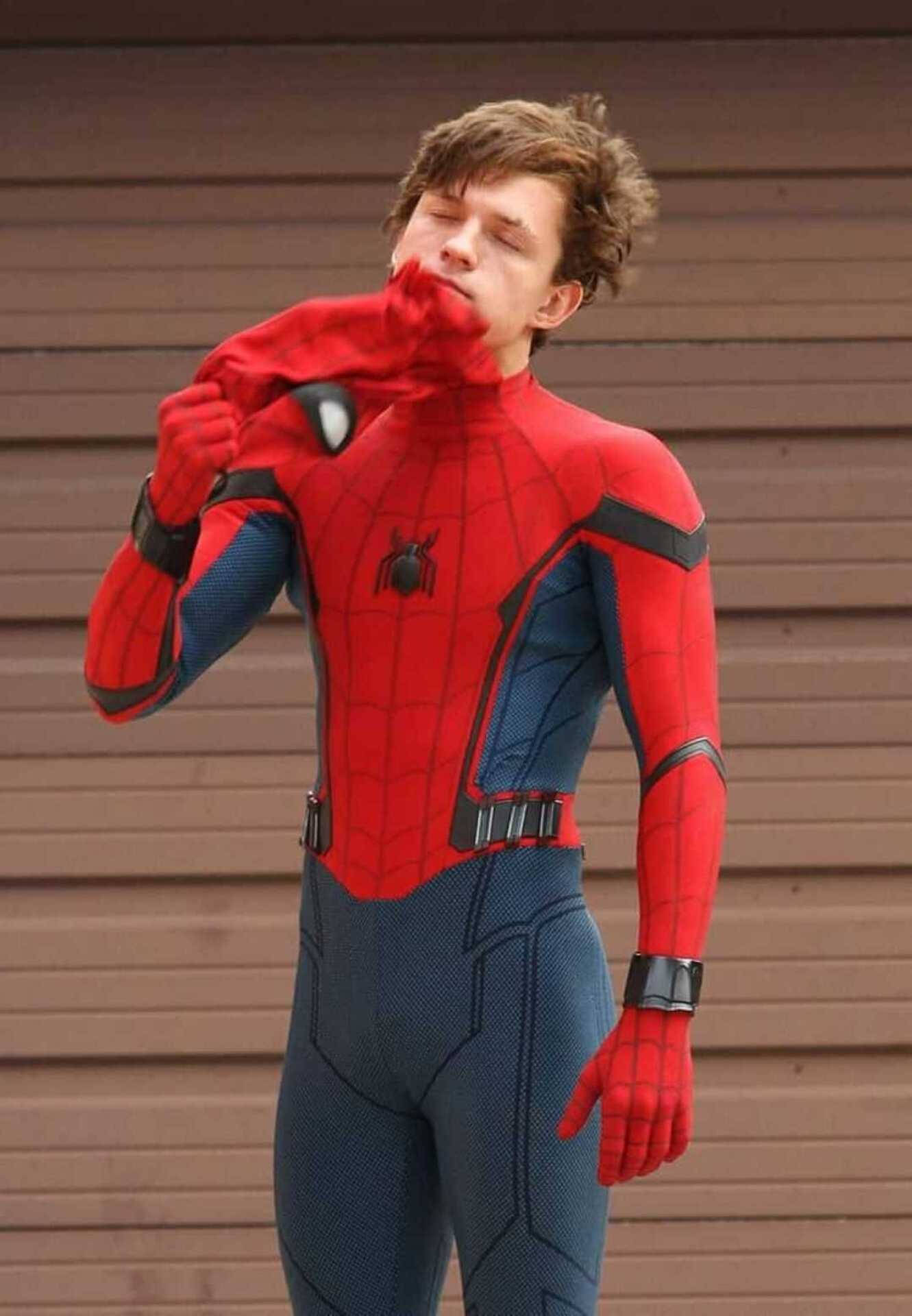 Tom Holland In Character At A Movie Set Background