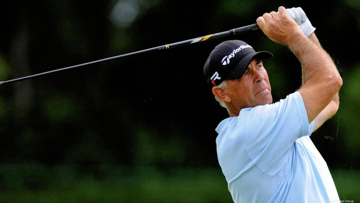 Tom Lehman Golfing In A Field Background