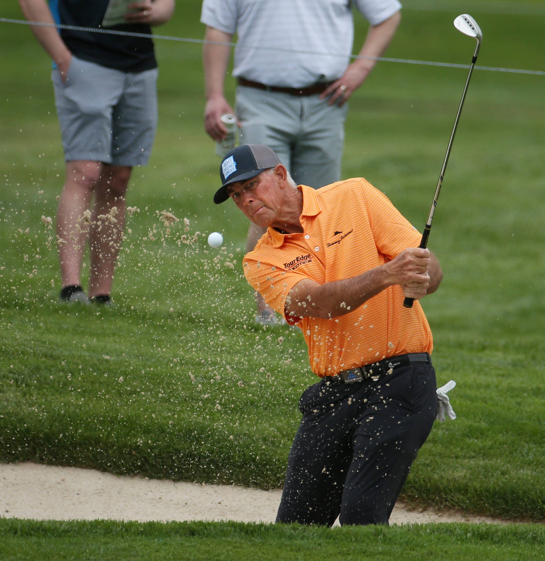 Tom Lehman Spattering Dirt While Swinging Background