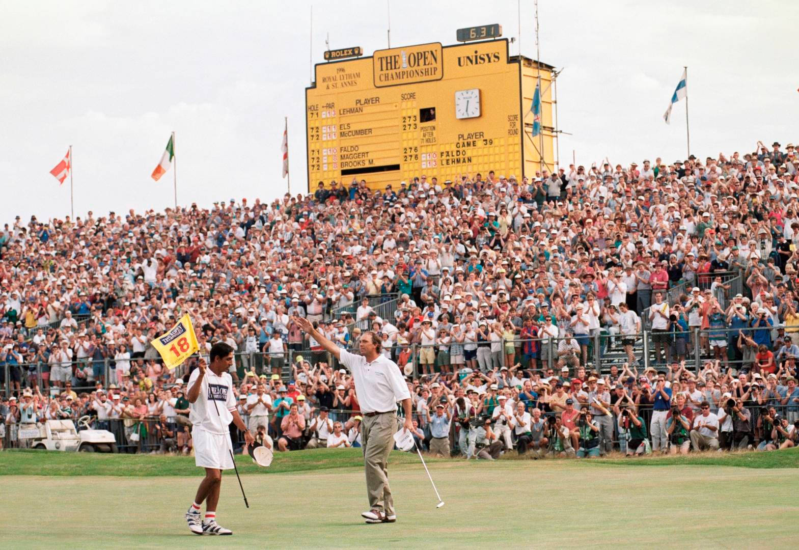 Tom Lehman Waving Amidst A Crowd Background