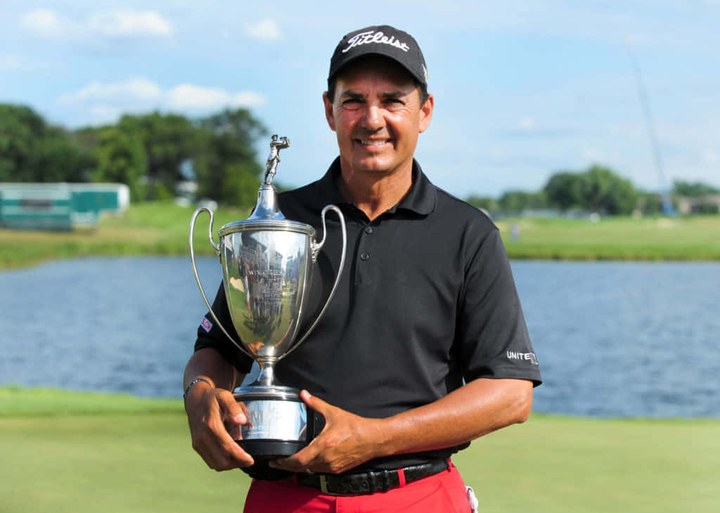 Tom Pernice Jr. Holding Trophy Background