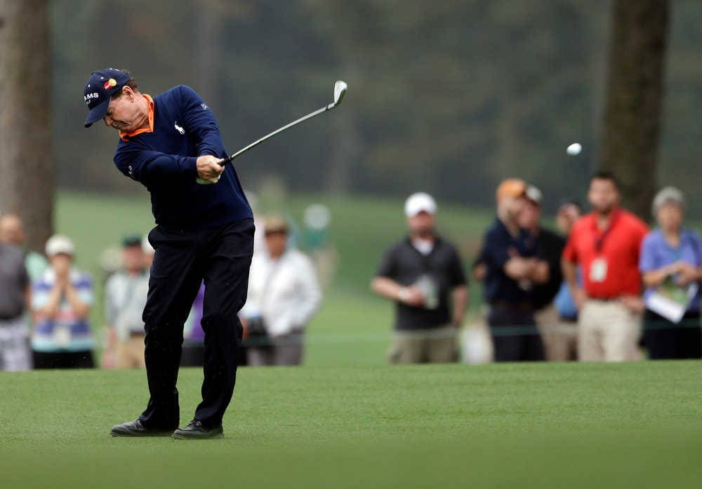 Tom Watson Focused On His Golf Shot Background