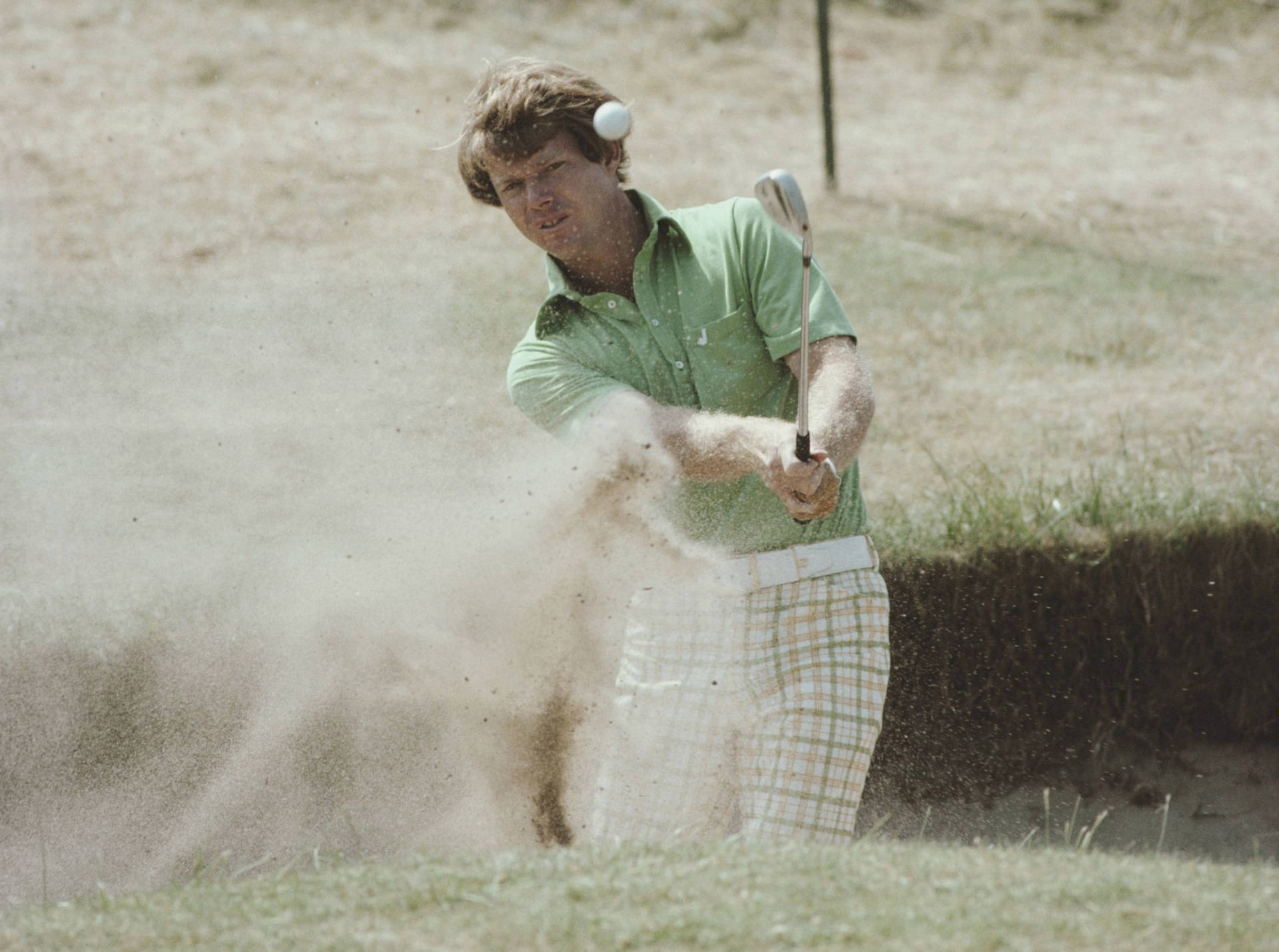 Tom Watson Hitting Sand Background