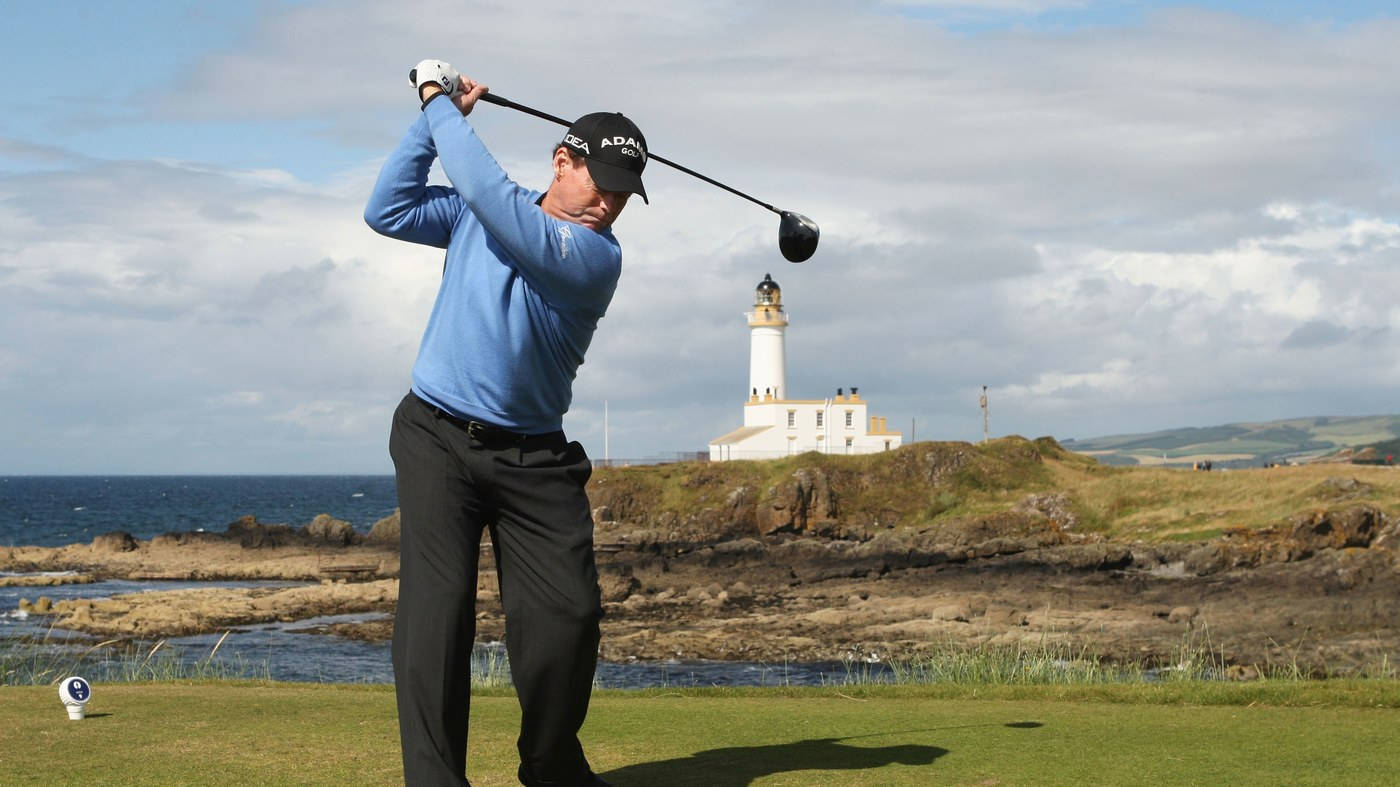 Tom Watson Swinging His Golf Club Background