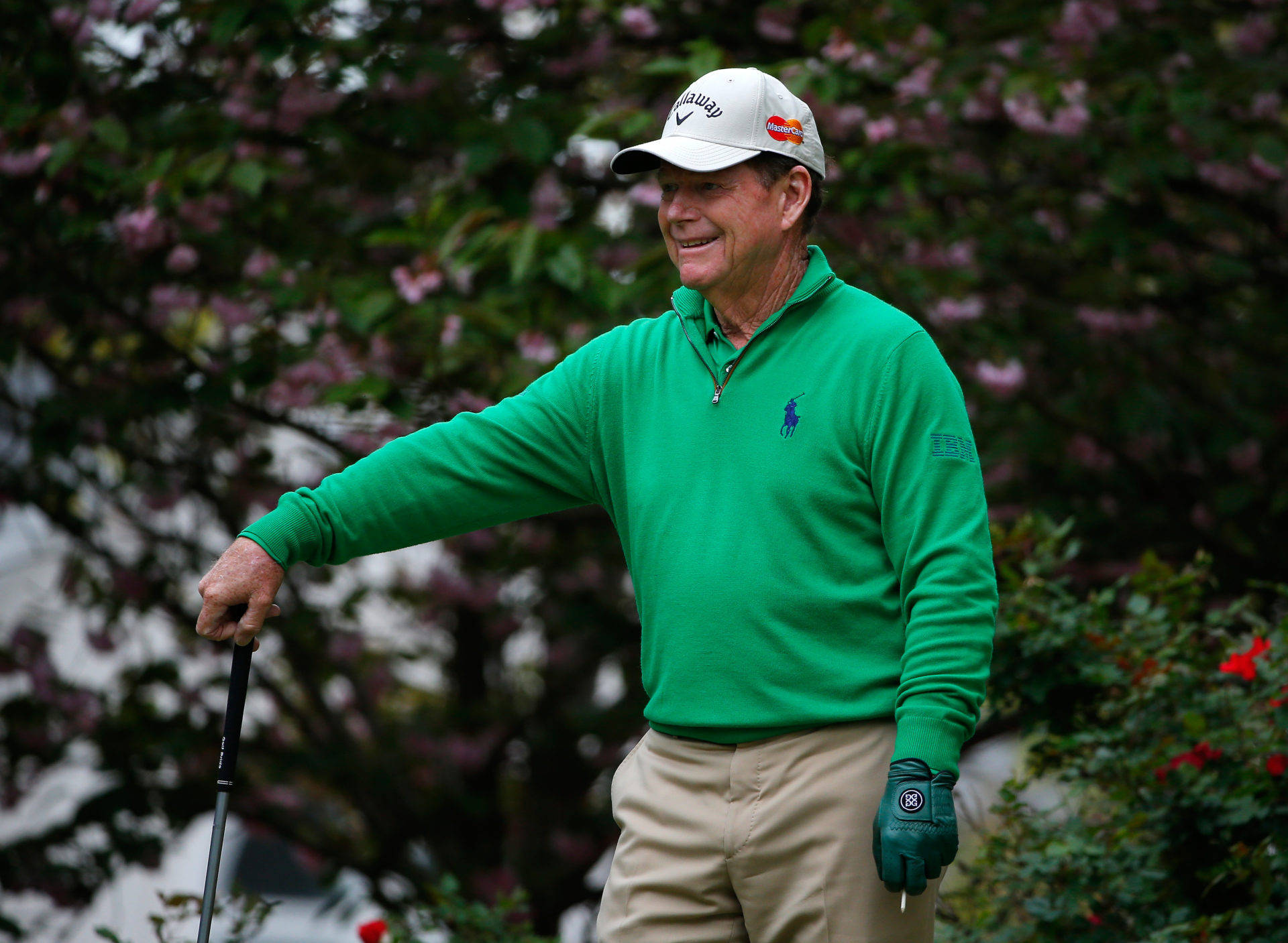 Tom Watson Wearing Green Sweater Background