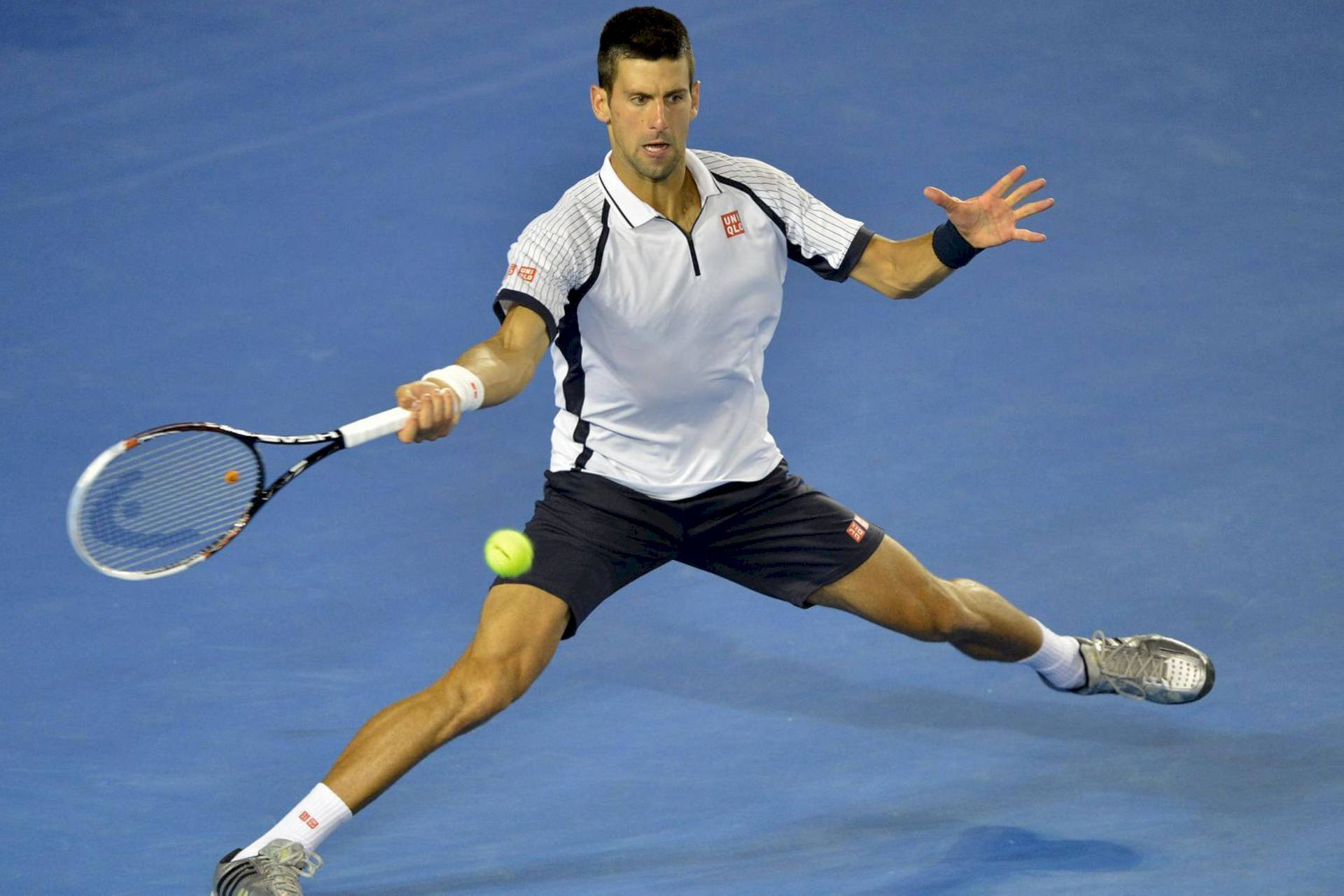 Tomas Berdych In Action On The Tennis Court Background