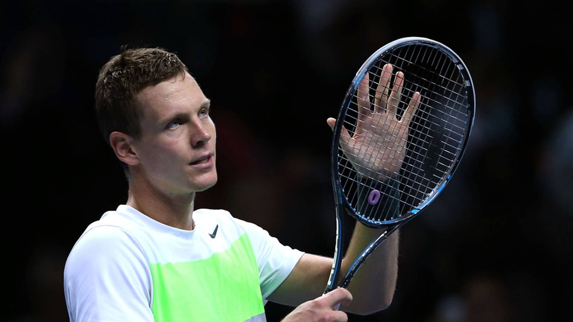 Tomas Berdych Inspecting Tennis Racket