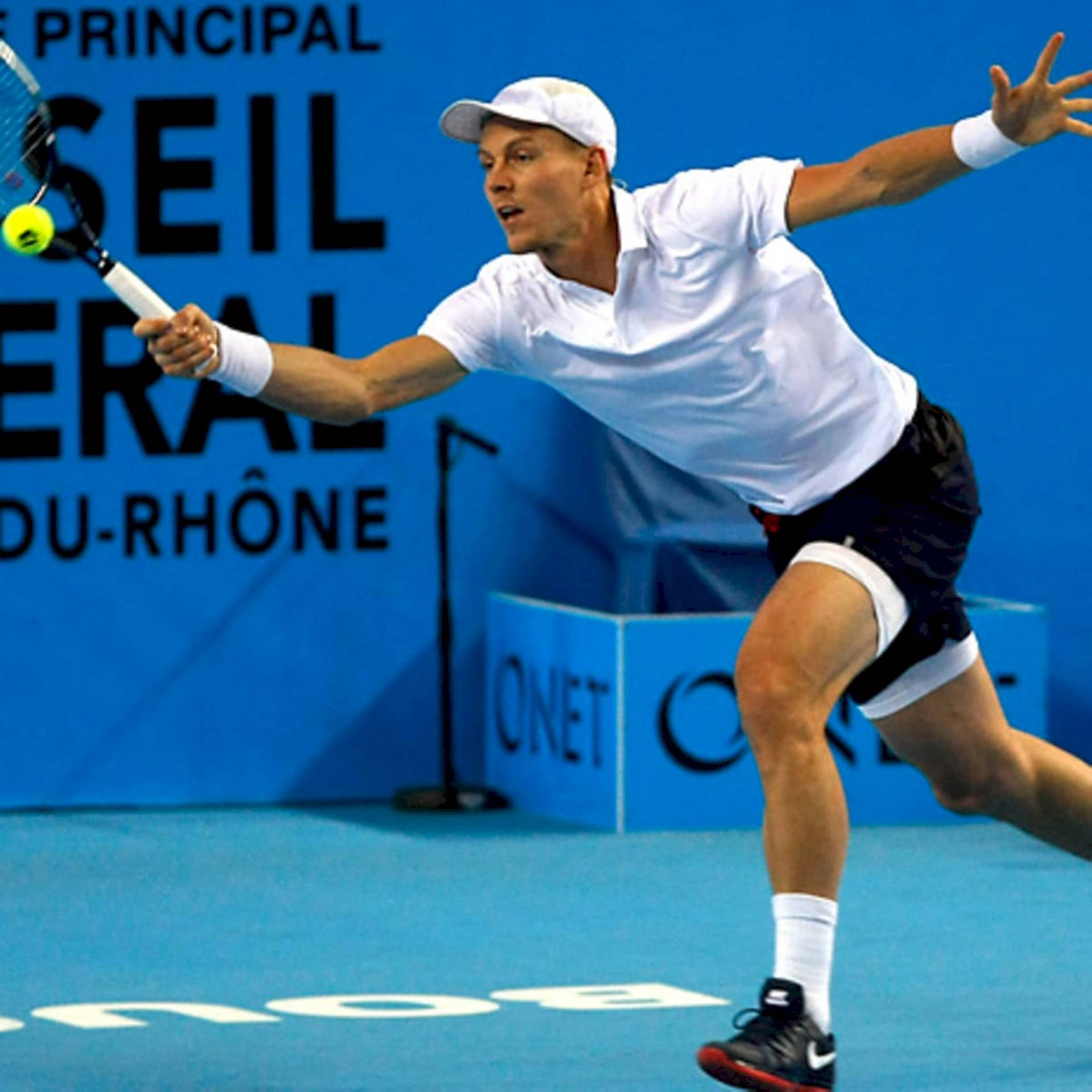 Tomas Berdych Reaching To Hit Ball