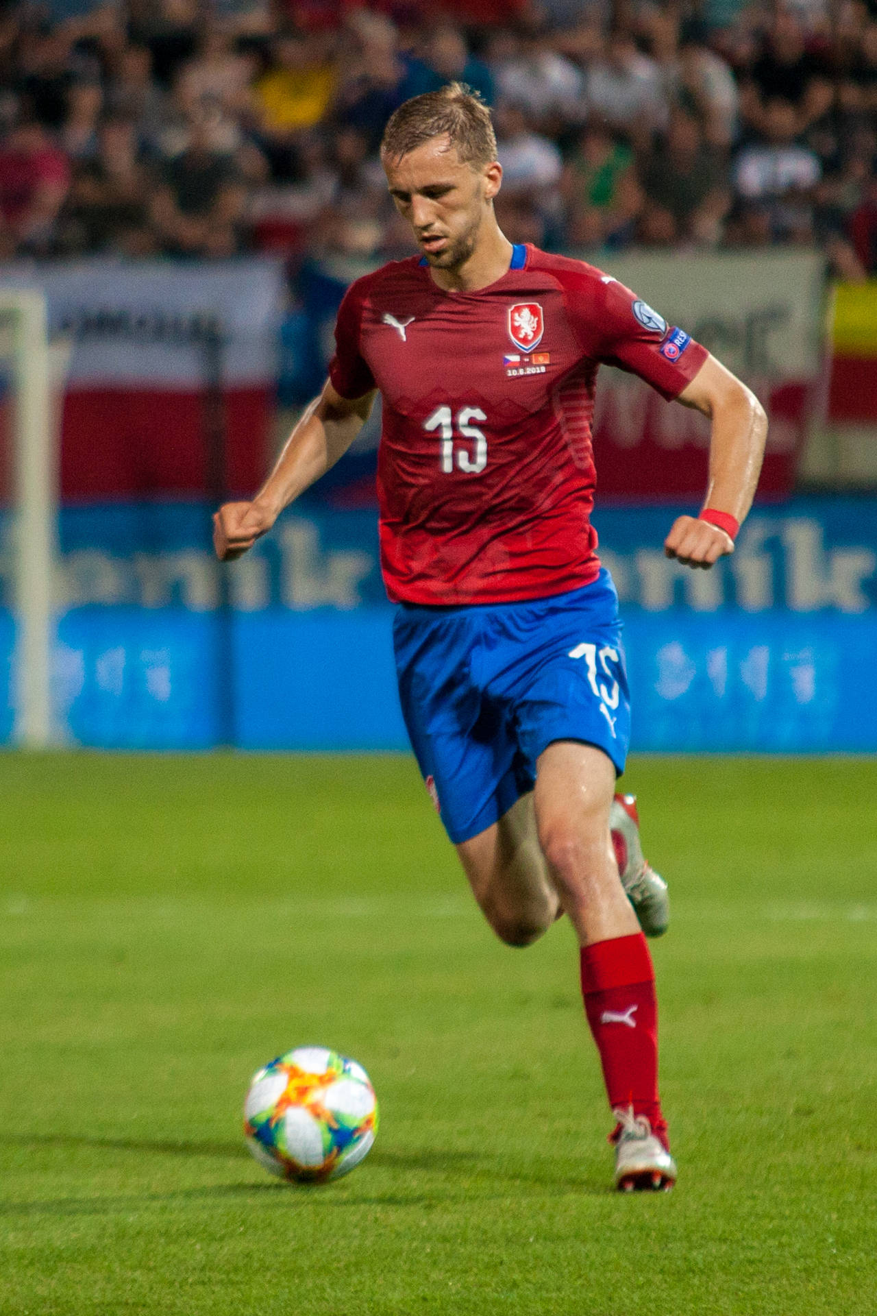 Tomas Soucek Dribbling A Soccer Ball Background