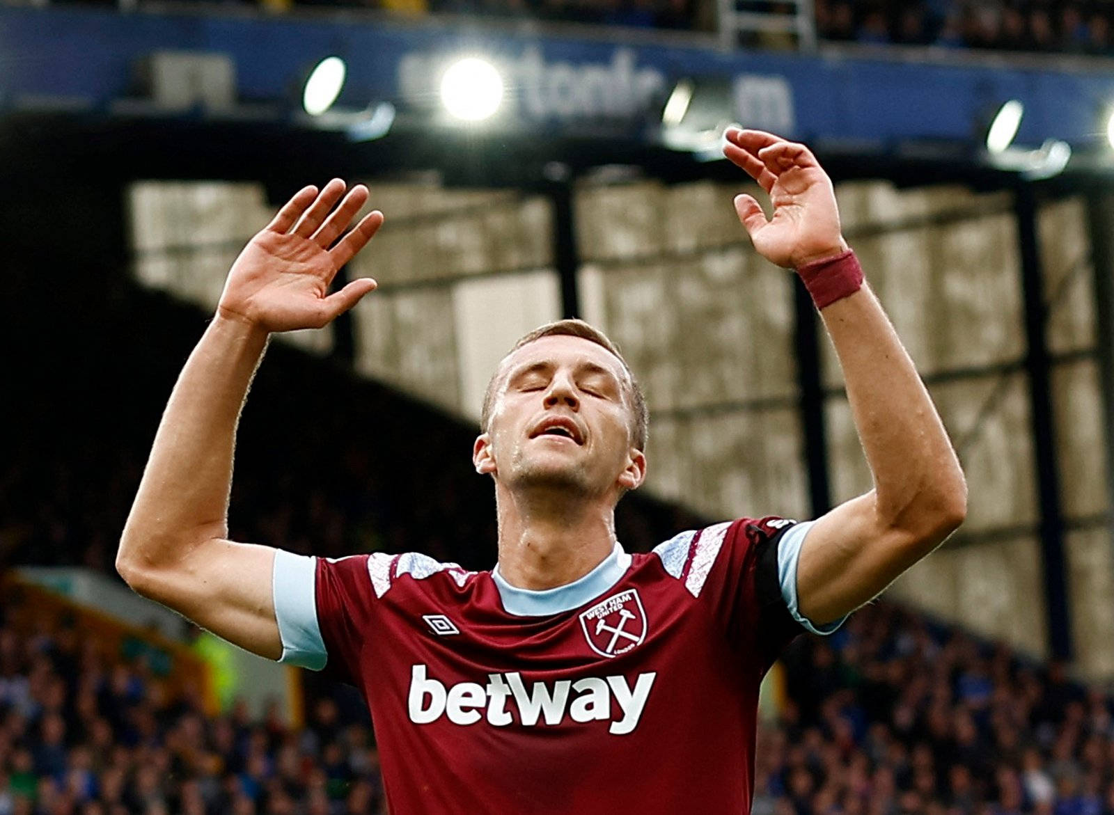 Tomas Soucek Raising His Hands Background