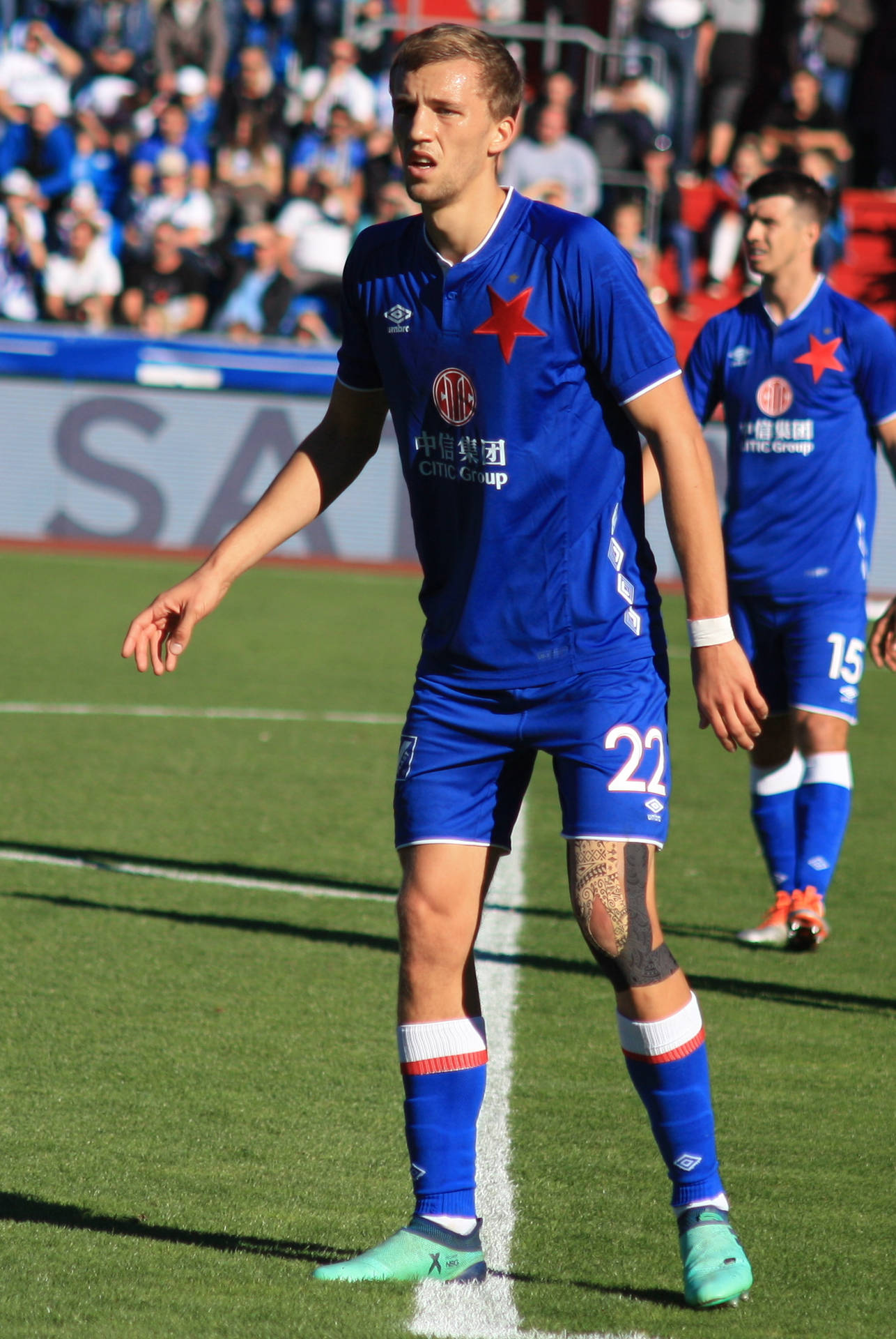 Tomas Soucek Wearing A Blue Jersey Background