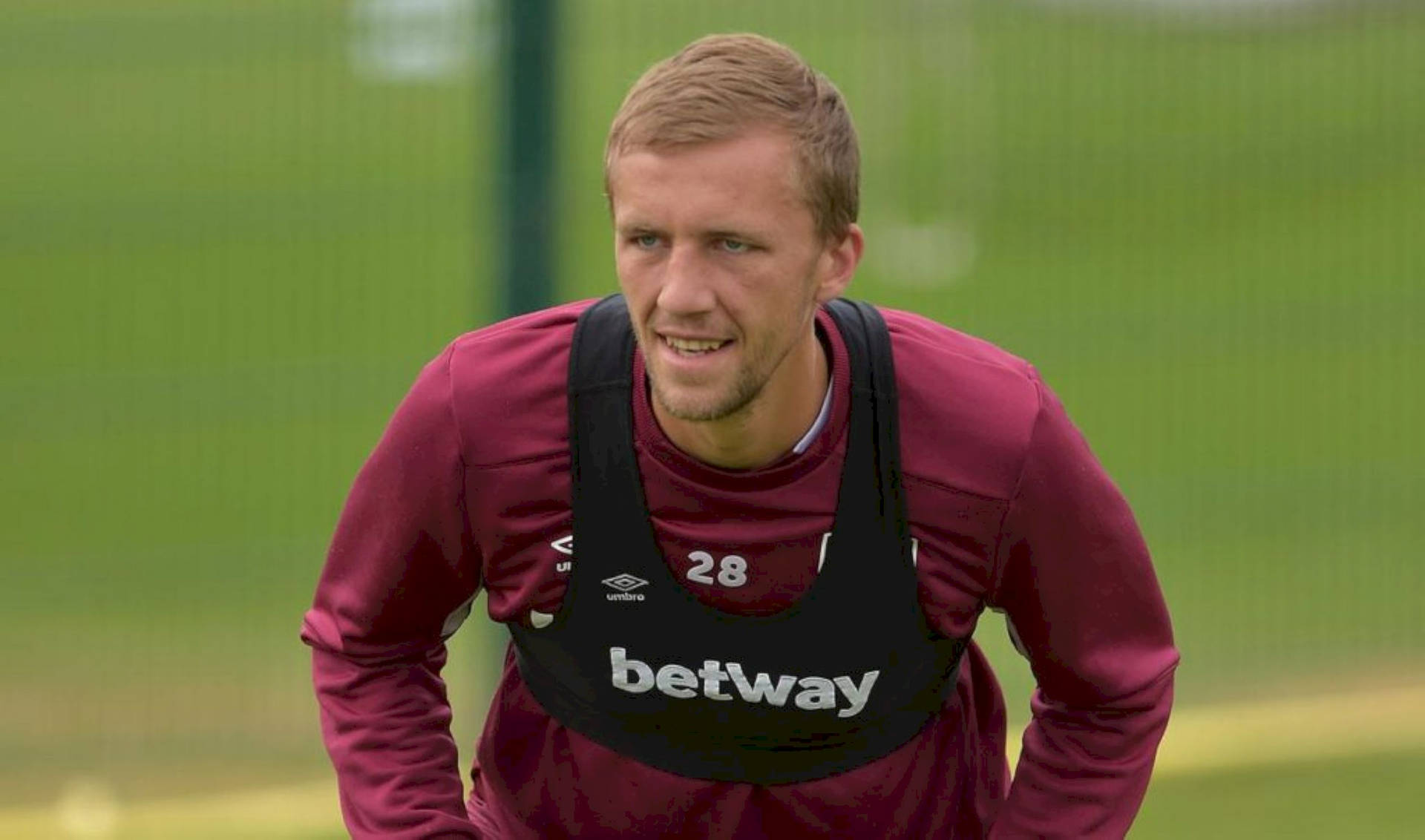 Tomas Soucek Wearing Jersey And Vest Background