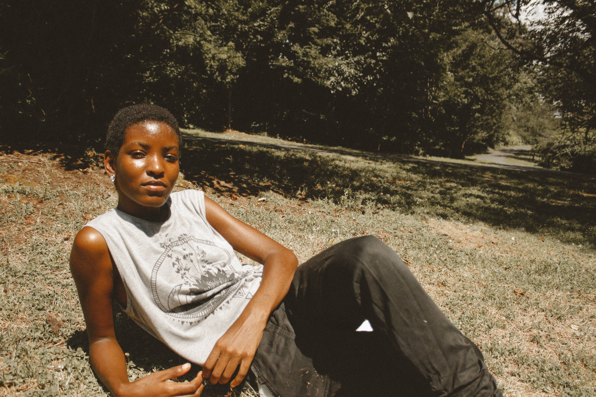 Tomboy On A Field Background