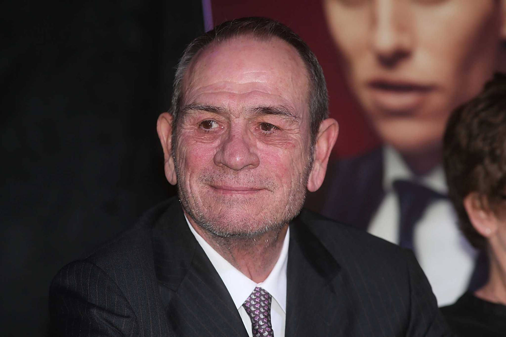 Tommy Lee Jones Grinning Faintly