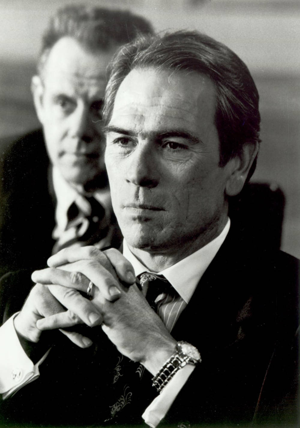 Tommy Lee Jones Hands Clasped Background