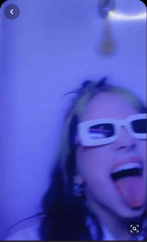 Tongue Out Billie Eilish Purple Background