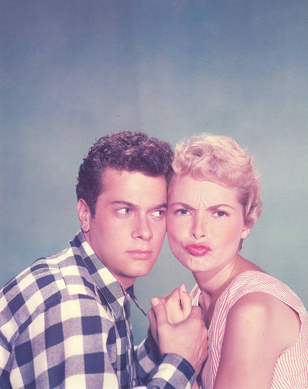 Tony Curtis With A Woman Background