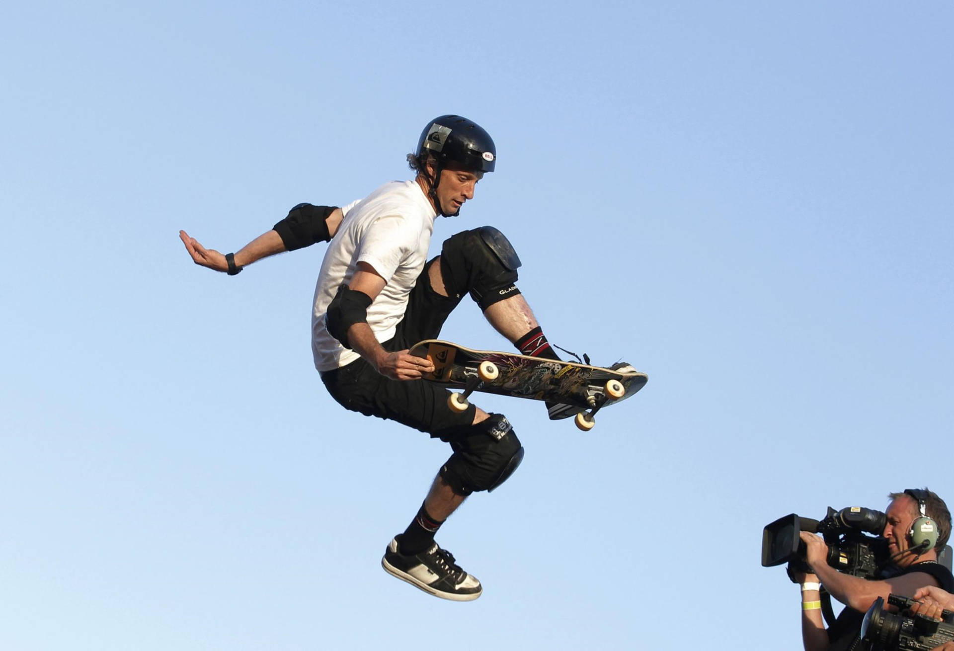 Tony Hawk Skateboarder On Cam Background