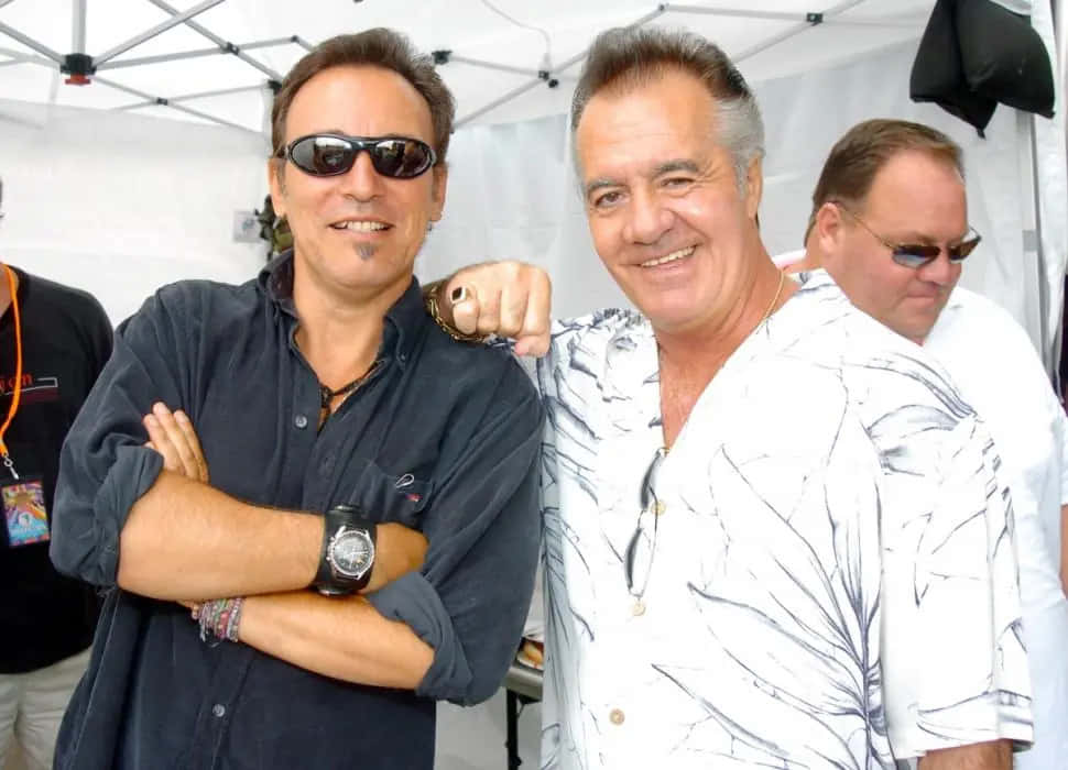 Tony Sirico Posing With A Cigar Background