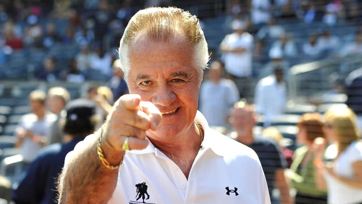 Tony Sirico Strikes A Pose In Character As Paulie Walnuts Background