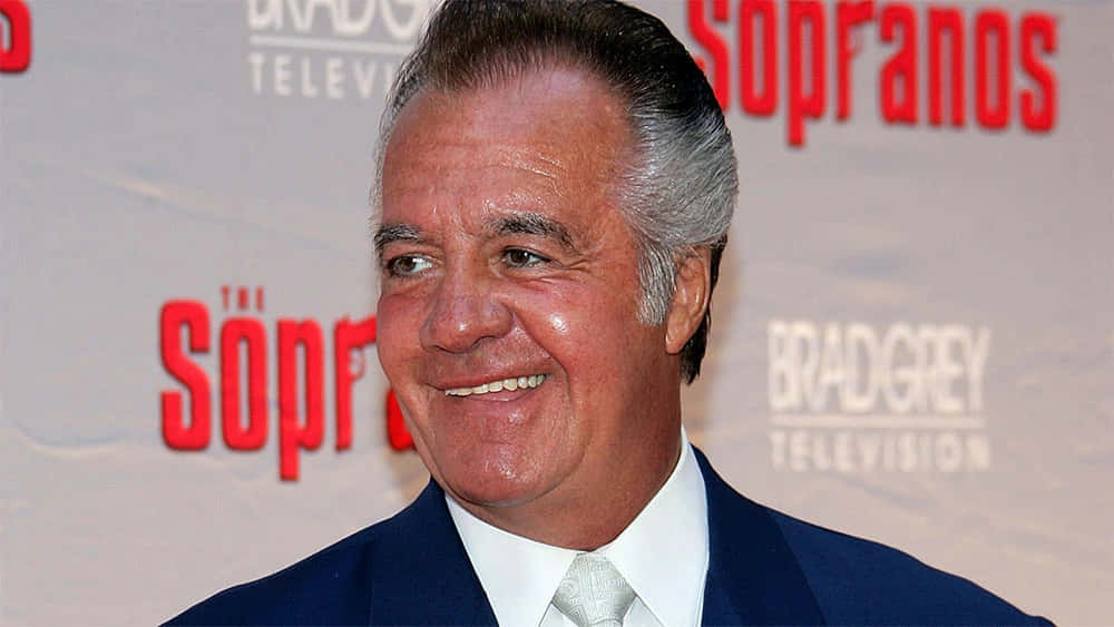 Tony Sirico Striking A Pose At An Event Background