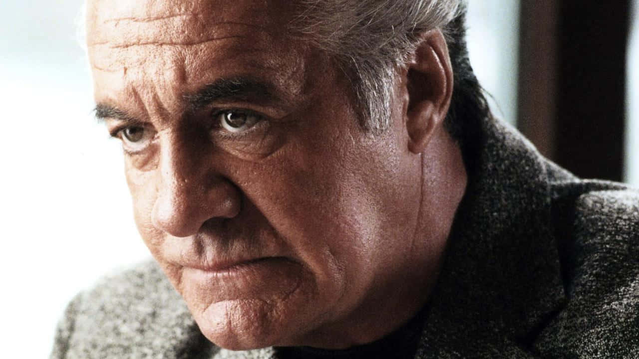 Tony Sirico Striking A Pose In A Dapper Suit. Background
