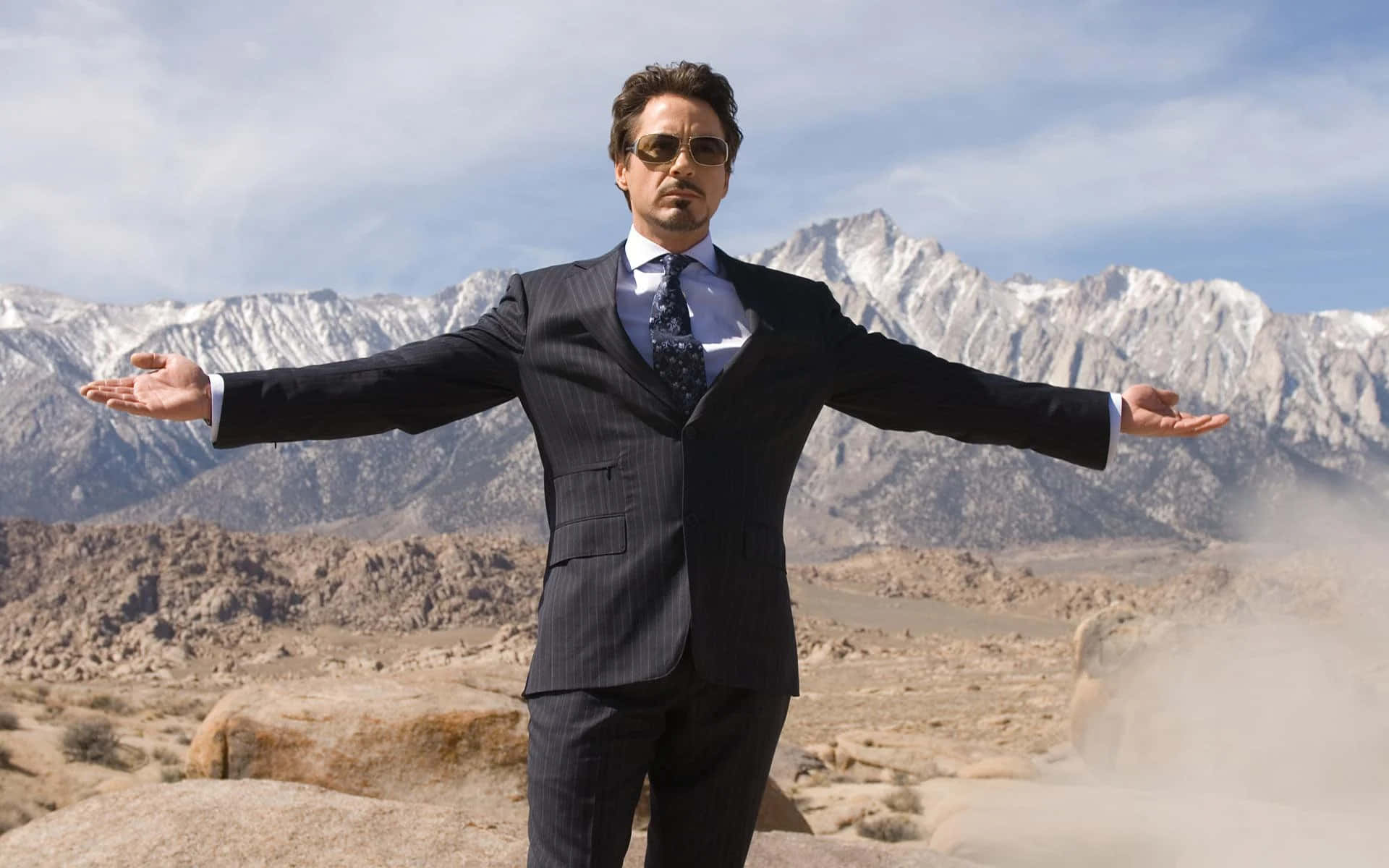 Tony Stark Desert Pose Background