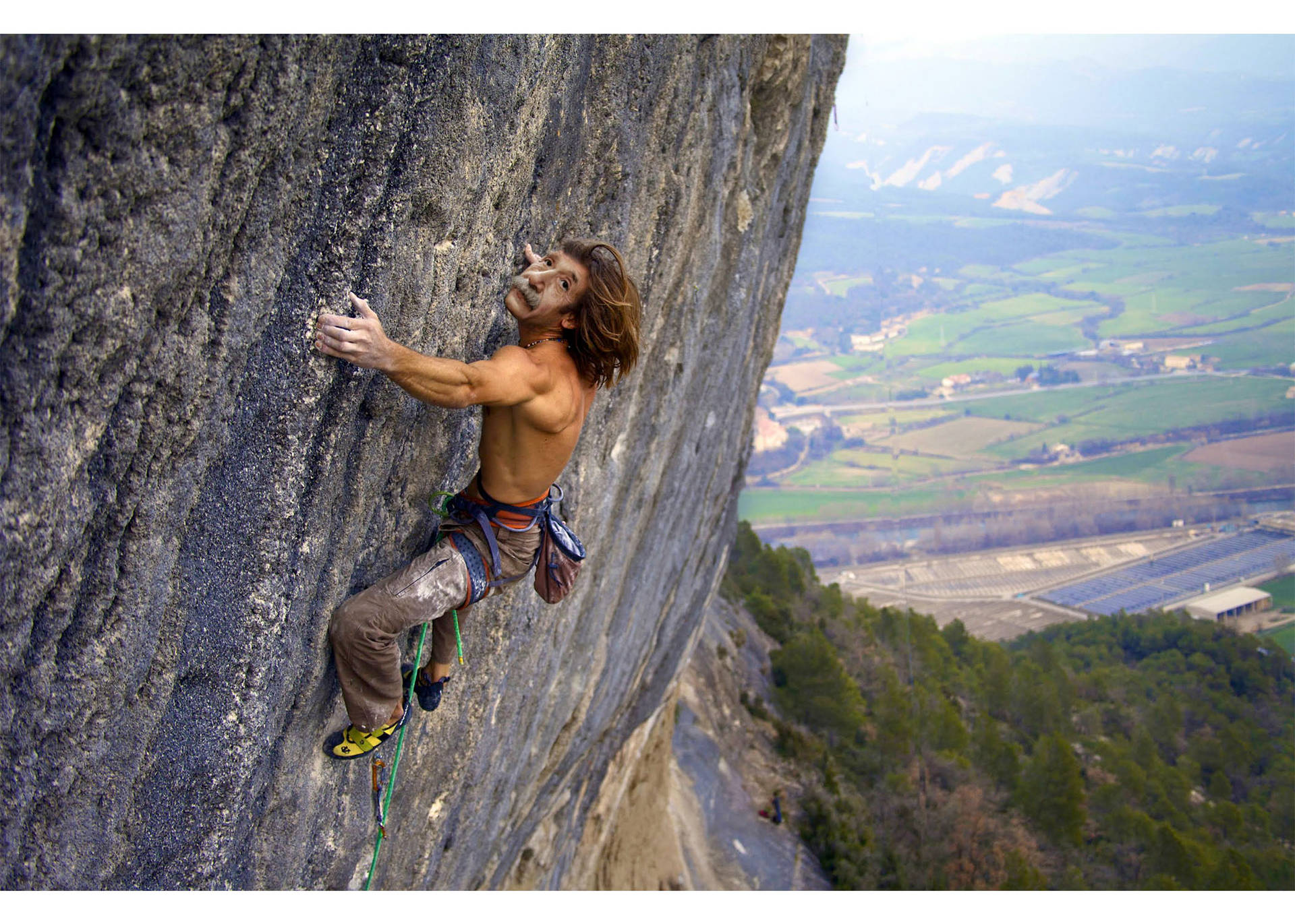 Topless Man Rock Climbing Background