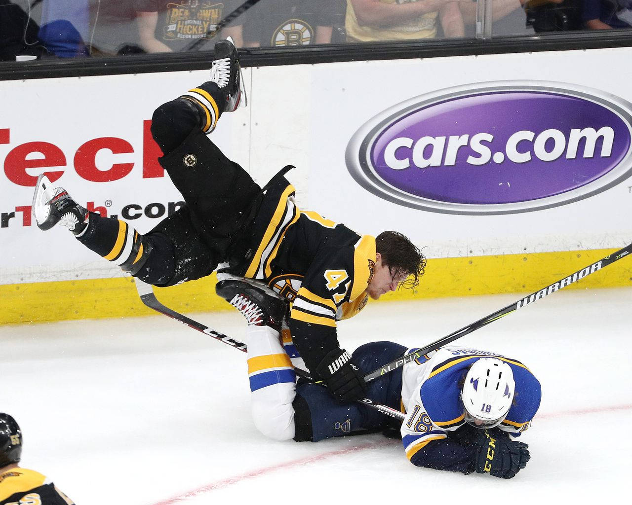 Torey Krug In Action During A Hockey Game Against Robert Thomas