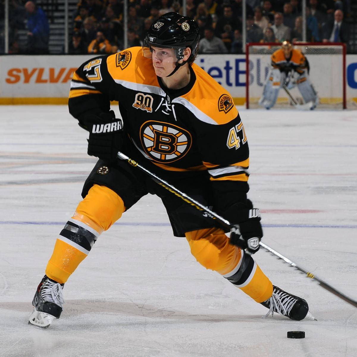 Torey Krug Maneuvering The Puck During An Nhl Game, November 2014